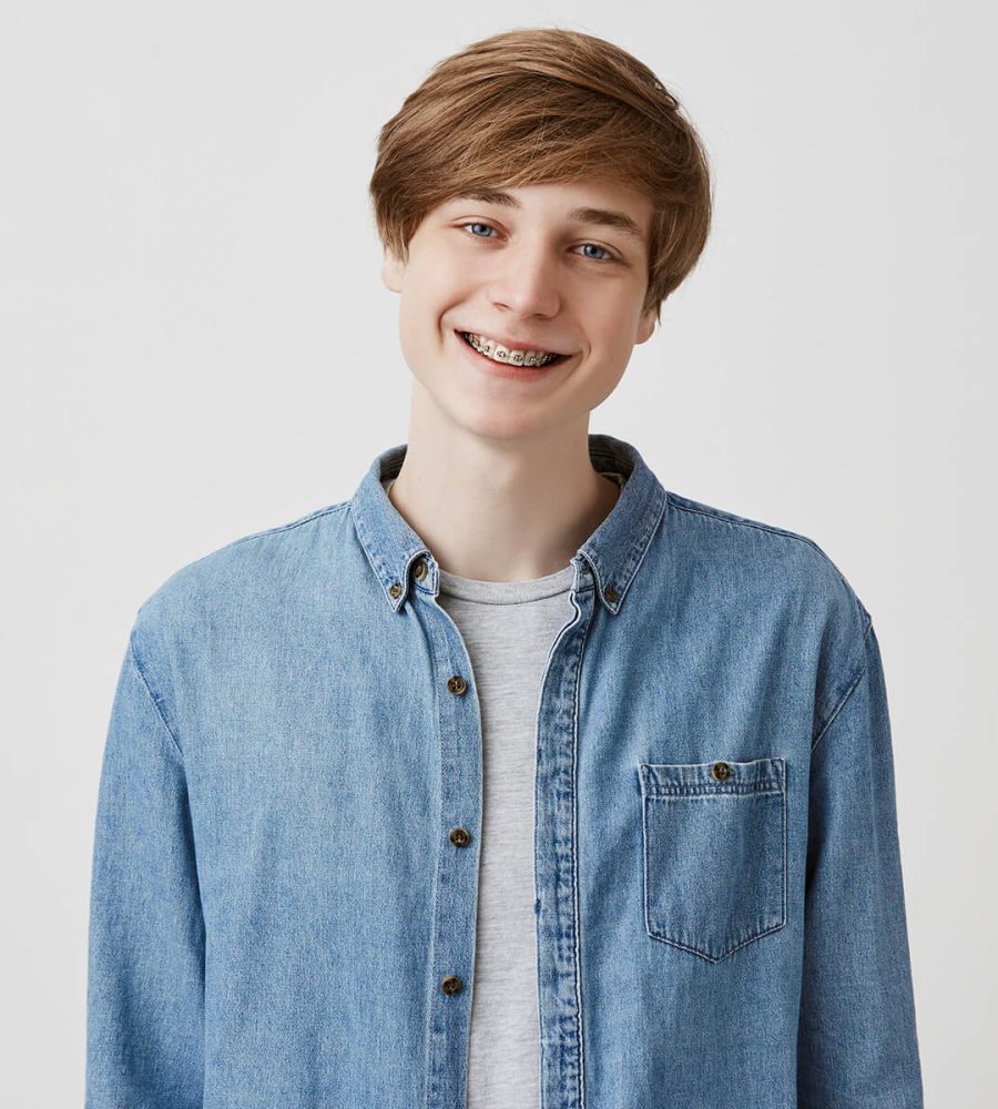 happy-young-european-man-with-fair-hair-and-blue-e-E7C8J8M